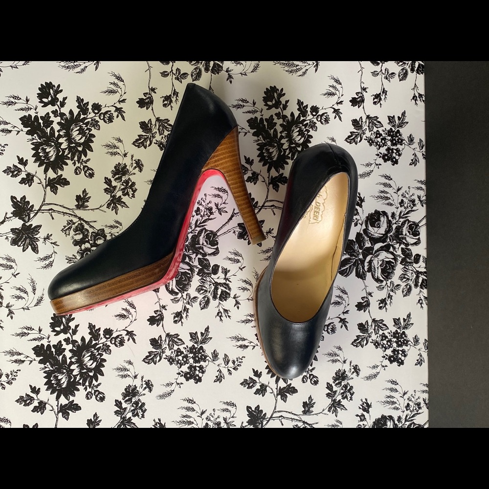 Oh Deer! brand red bottom heels.
